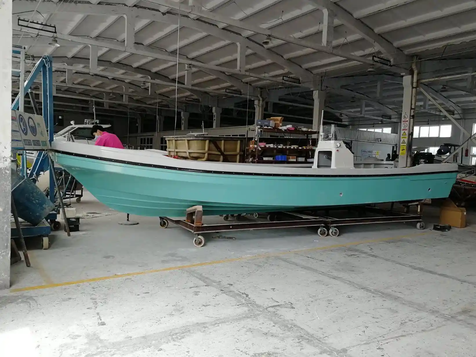 Skilled workforce assembling a commercial passenger ship